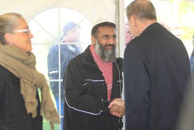 IOC-Præsident Jaques Rogge hilser på Muhammad Aslam